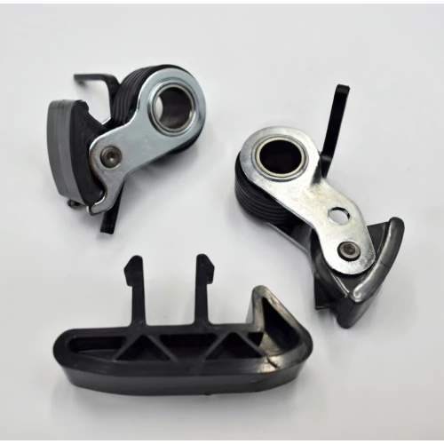 Chain tensioners and guides for chain drive systems